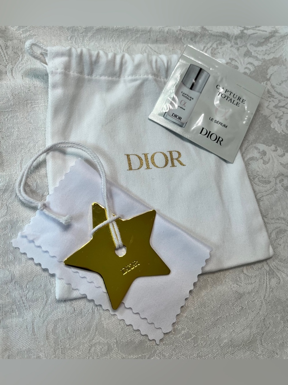 Dior Gold Star Charm, Dior Drawstring Pouch, Cleaning Cloth and Serum Sample - Picture 3 of 5